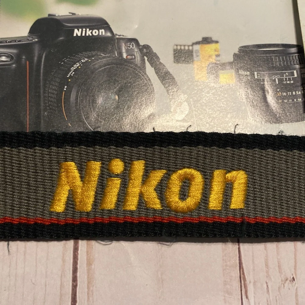 Vintage retro Nikon camera N50 strap and lens cover 1994 accessories